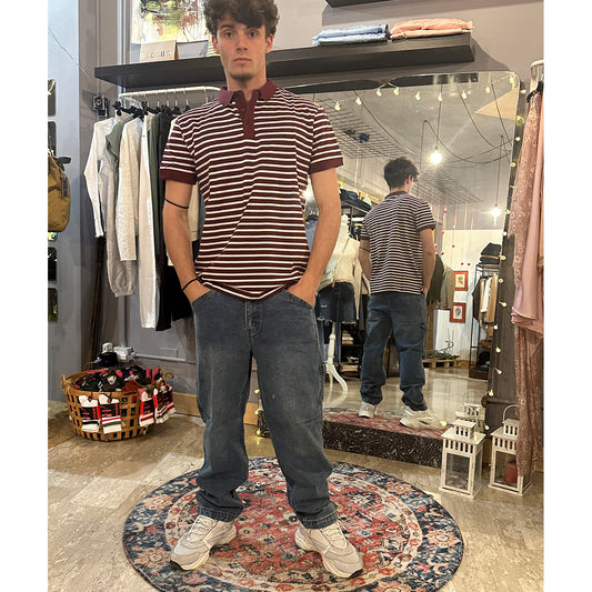 Polo rigata in piquè